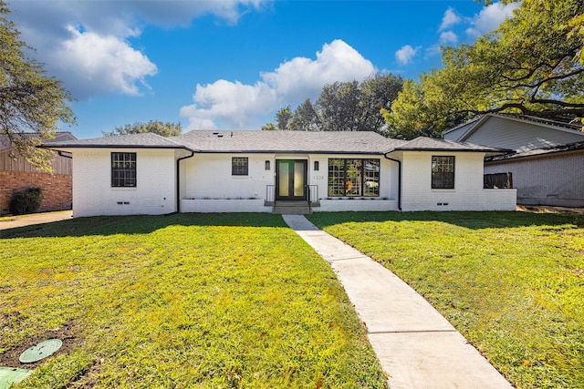 single story home featuring a front lawn