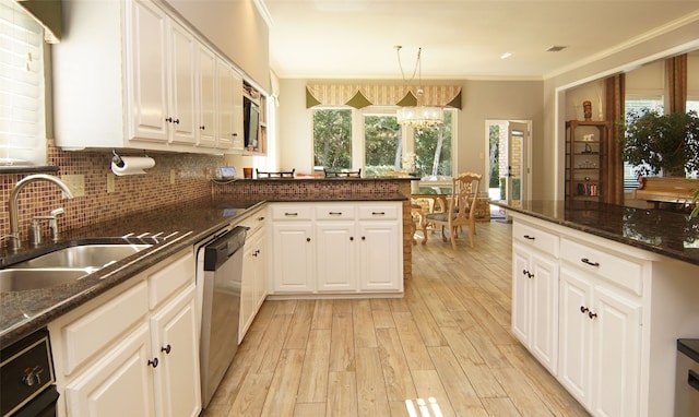 kitchen with white cabinets, dishwasher, light hardwood / wood-style floors, decorative light fixtures, and sink