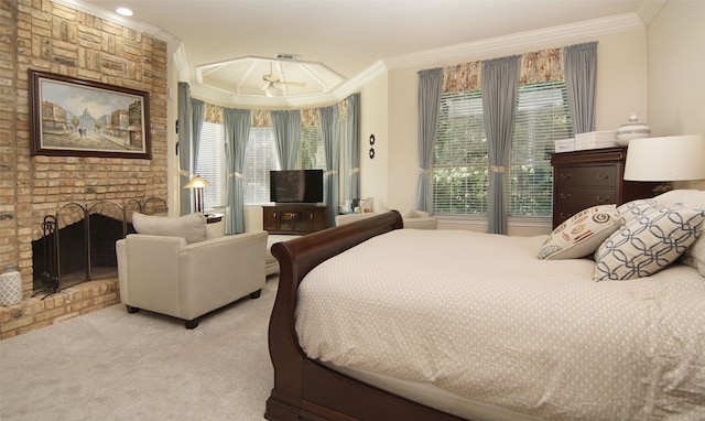 carpeted bedroom with ornamental molding and a fireplace