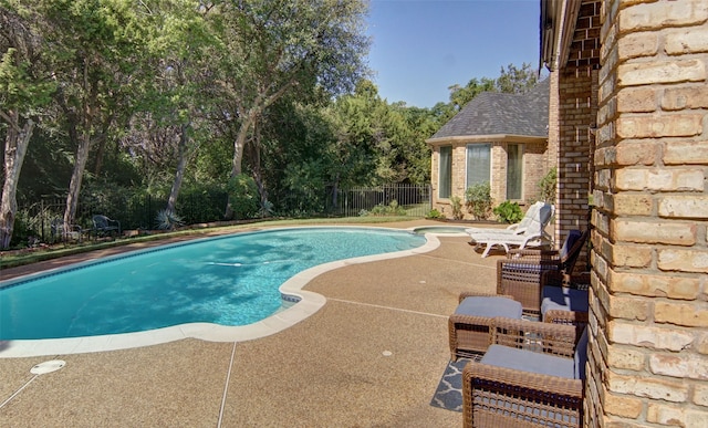 view of pool with a patio