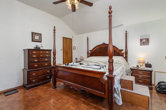 bedroom with parquet flooring, lofted ceiling, and ceiling fan