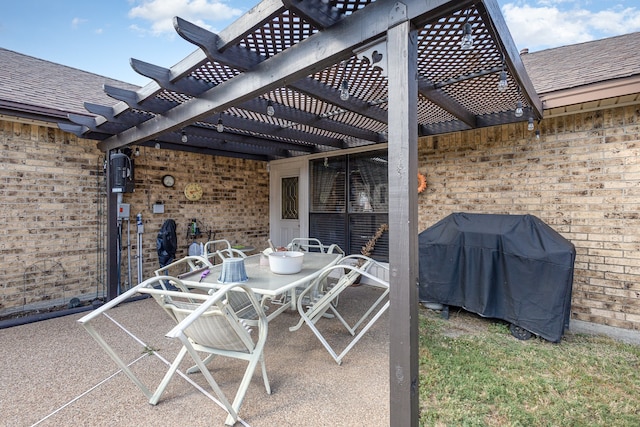 view of patio / terrace featuring a pergola and grilling area