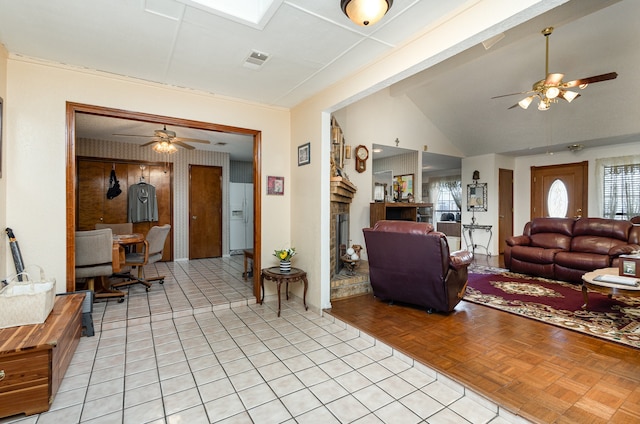 living room with light parquet flooring and lofted ceiling