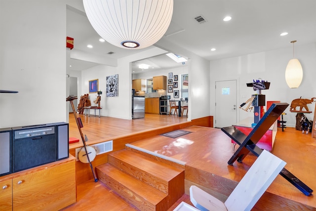 dining area with wood-type flooring