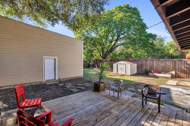 wooden terrace with a storage shed