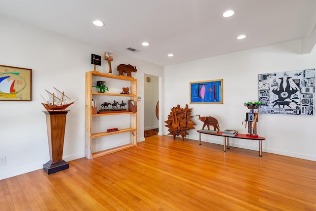 sitting room featuring light wood-type flooring