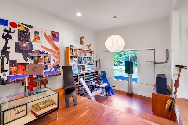 home office with hardwood / wood-style floors