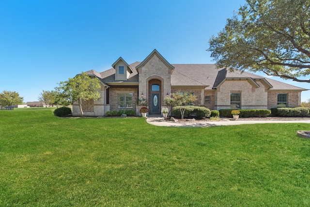 view of front facade with a front lawn