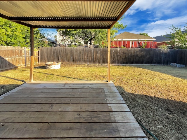 view of yard featuring a wooden deck