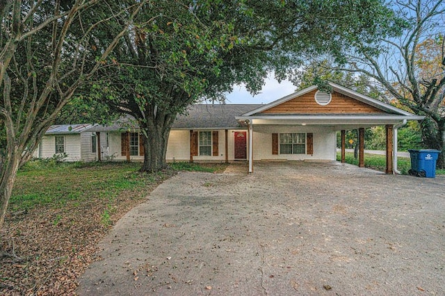 view of front of home featuring a carport