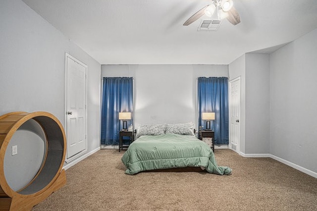 carpeted bedroom featuring ceiling fan