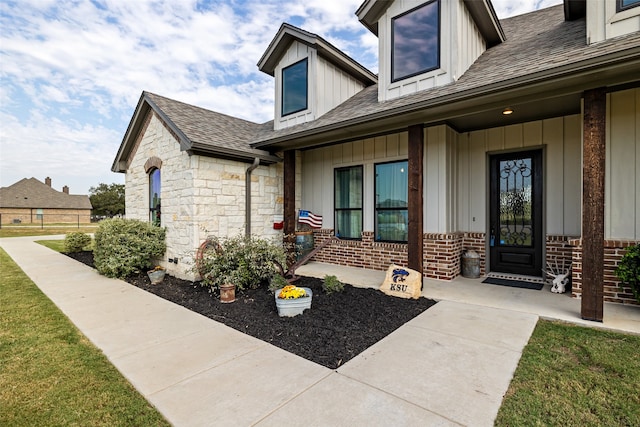 property entrance featuring covered porch