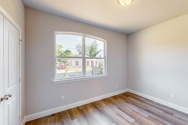 spare room featuring light hardwood / wood-style floors