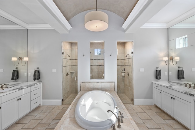 bathroom featuring vanity, crown molding, plus walk in shower, and tile patterned floors