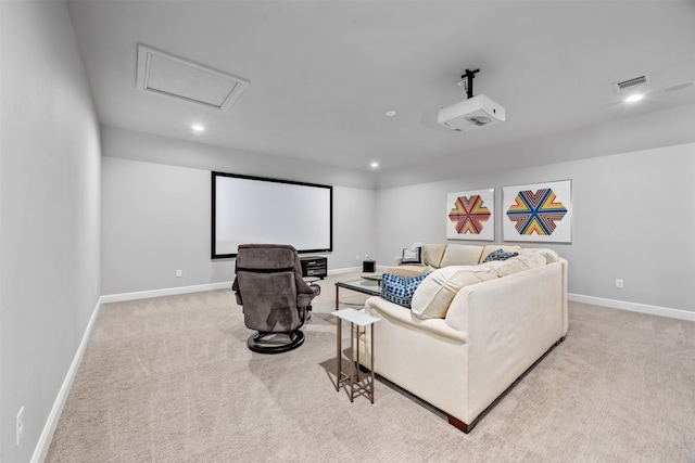 home theater room with light carpet