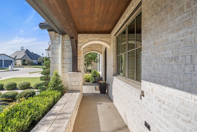 view of exterior entry with a garage