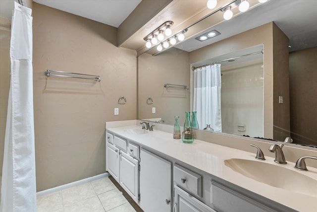 bathroom featuring vanity and tile patterned flooring