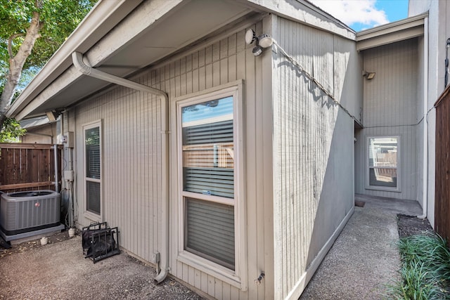 view of property exterior with central AC unit