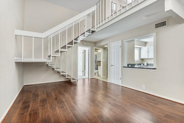 foyer with wood-type flooring