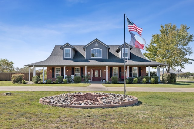 view of front of home featuring a porch and a front yard