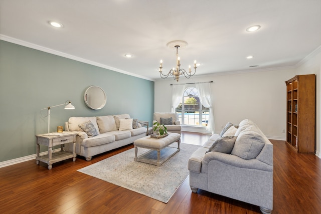 living room with an inviting chandelier, ornamental molding, and dark hardwood / wood-style flooring