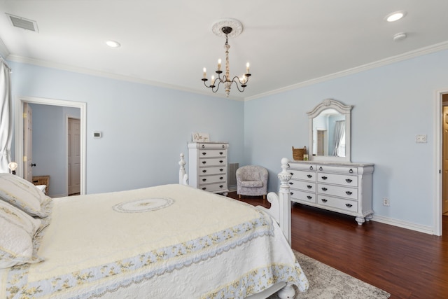 bedroom with ornamental molding, dark hardwood / wood-style floors, and a chandelier