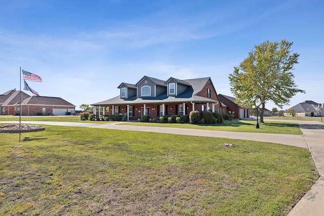 new england style home featuring a front lawn