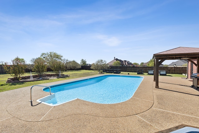 view of swimming pool with a patio, a gazebo, and a lawn