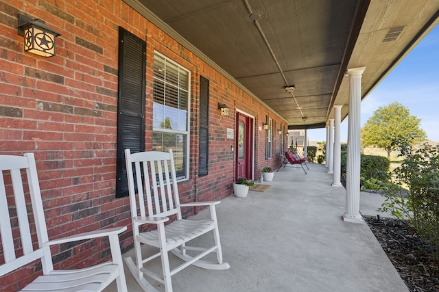 view of patio featuring a porch