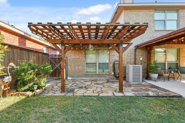 view of patio / terrace with a pergola and central air condition unit