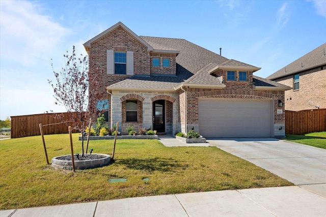 1934 Sand Springs St, Forney, TX 75126 - traditional home with roof with shingles, a front lawn, concrete driveway, fence, and brick siding