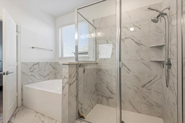 bathroom featuring tile walls and plus walk in shower