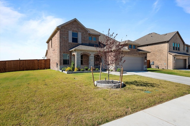 view of front facade with a garage and a front lawn