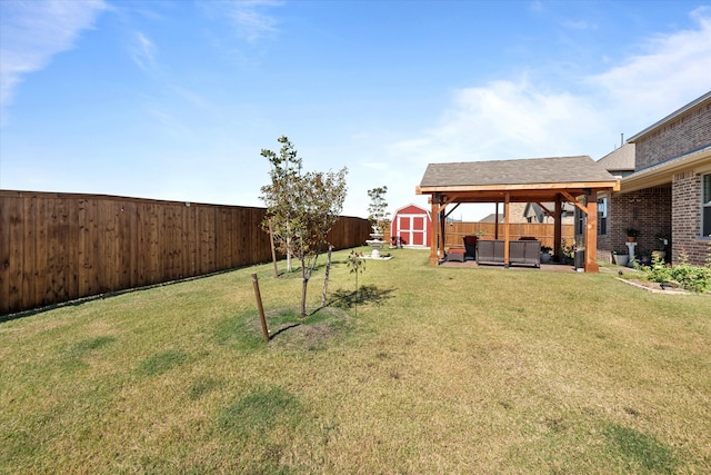 view of yard with a patio area, a storage shed, and an outdoor living space