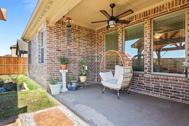 view of patio / terrace featuring ceiling fan