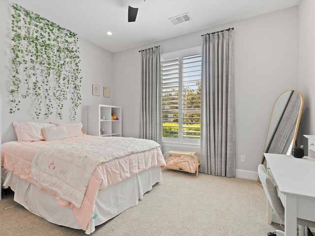 carpeted bedroom with ceiling fan