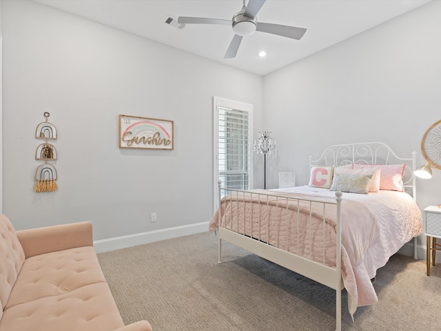 carpeted bedroom with ceiling fan