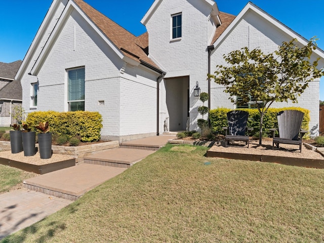 view of front property with a front lawn