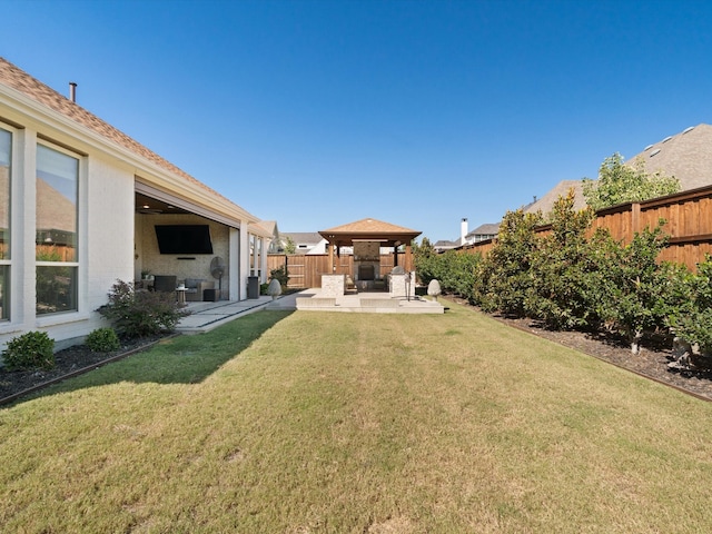 view of yard featuring a gazebo and a patio