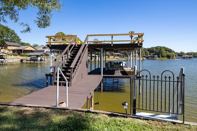 dock area with a water view