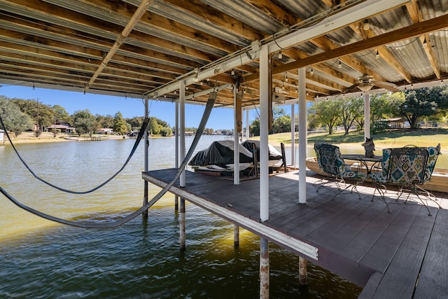 view of dock with a water view