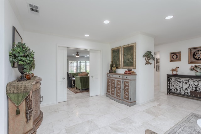 corridor with crown molding