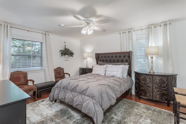 bedroom featuring ceiling fan and wood-type flooring