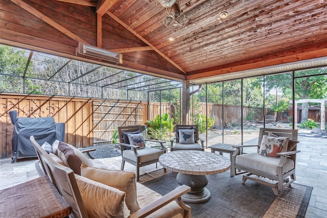 sunroom / solarium featuring wooden ceiling and vaulted ceiling with beams