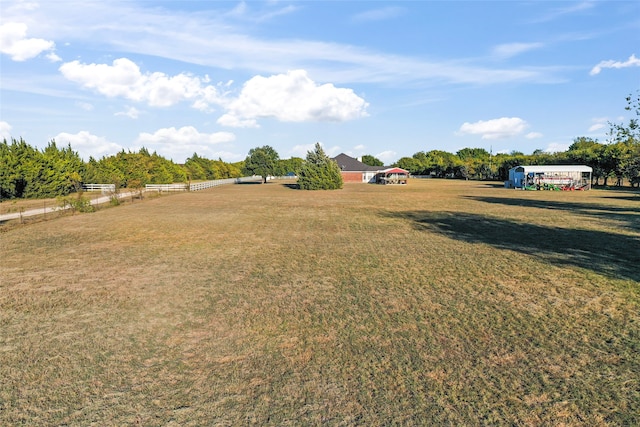 view of yard featuring a rural view