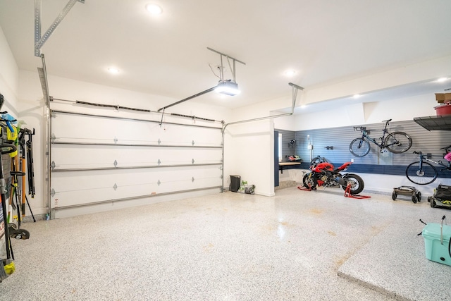 garage featuring a garage door opener