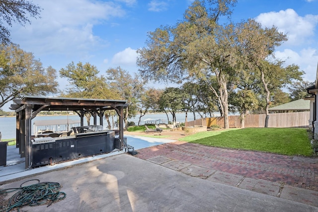 view of patio / terrace featuring a water view