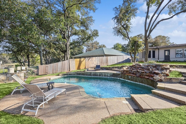 view of pool featuring a patio area