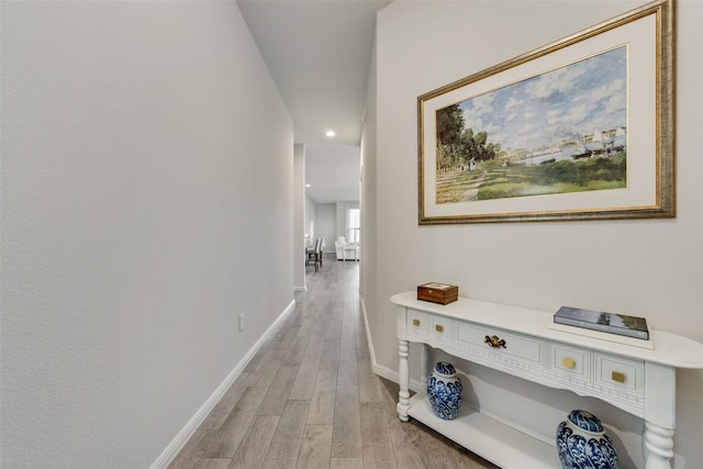 hall featuring light hardwood / wood-style floors