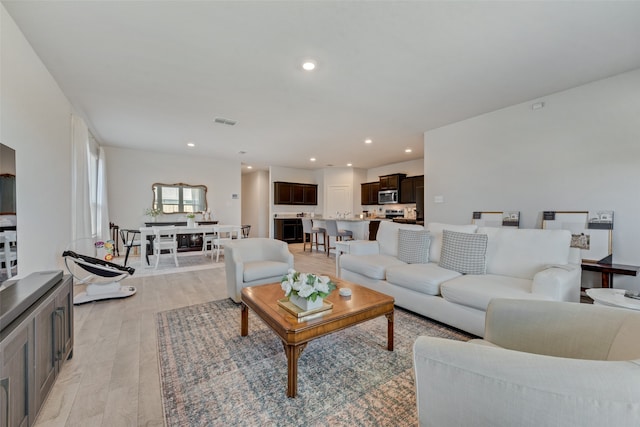 living room featuring light hardwood / wood-style flooring